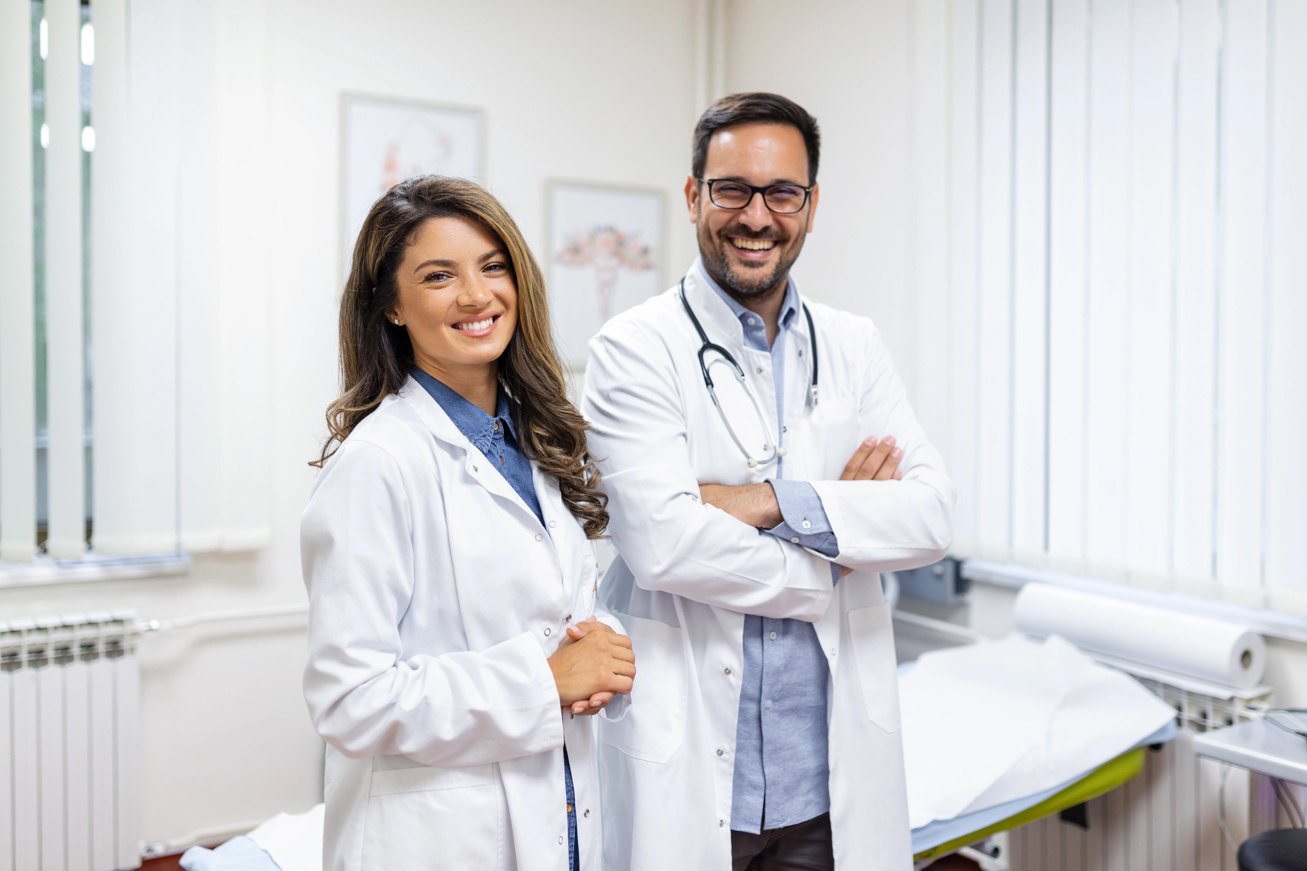 Care home medical staff standing together inside a facility