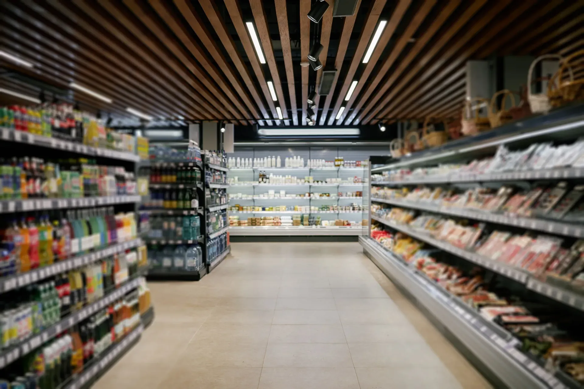 Merchandised shelves along a modern supermarket aisle